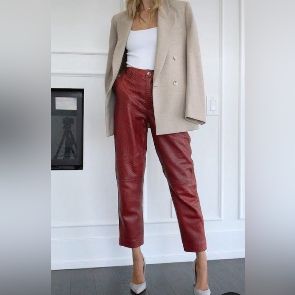 Red leather pant, special collab edition between H&M and Giambattista Valli.